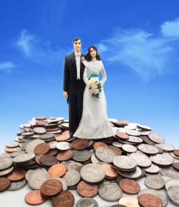 wedding couple on coins - money concept