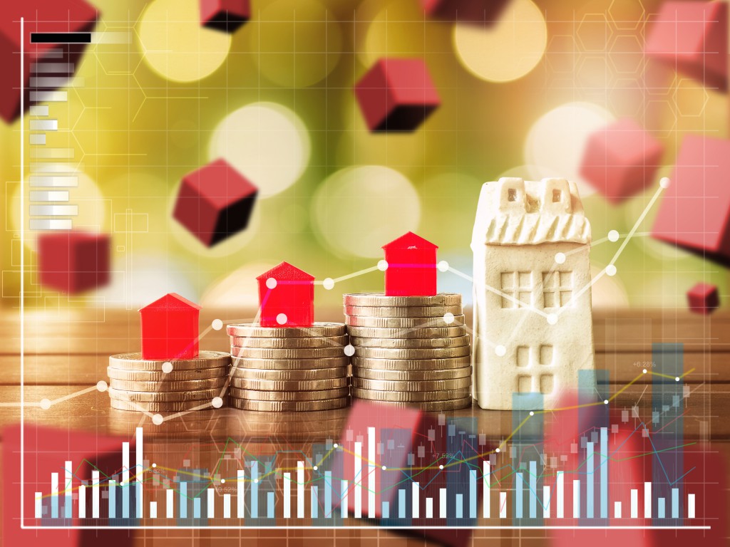Mortgage Concept By Money House From The Coins,business Finance And Money Concept,saving Money Concept To Buy A House.
